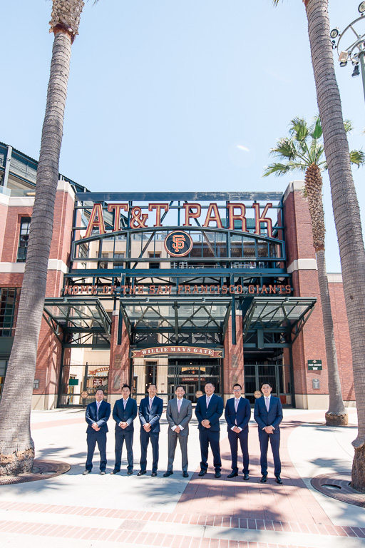groom with groomsmen in front of AT&T Park Willie Mays Giants stadium