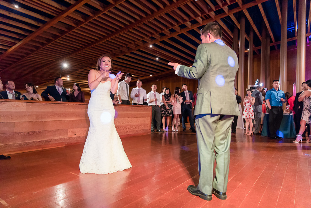 first dance between bride and groom at CuriOdyssey museum wedding