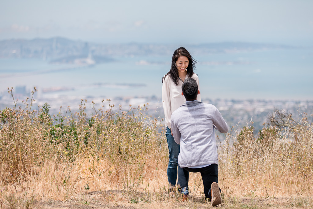 surprise proposal with San Francisco and Bay Bridge backdrop