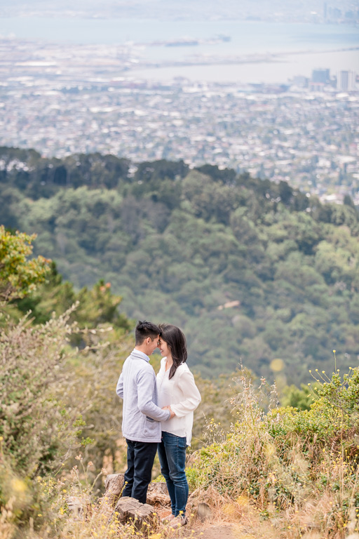 engagement photos at Grizzly Peak in Berkeley with Oakland and Bay Bridge in the distance
