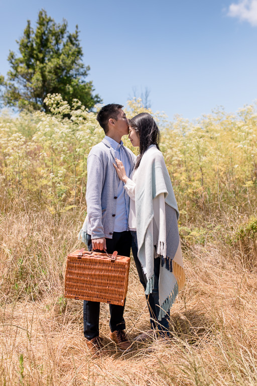 kiss on forehead in field of golden tall grass