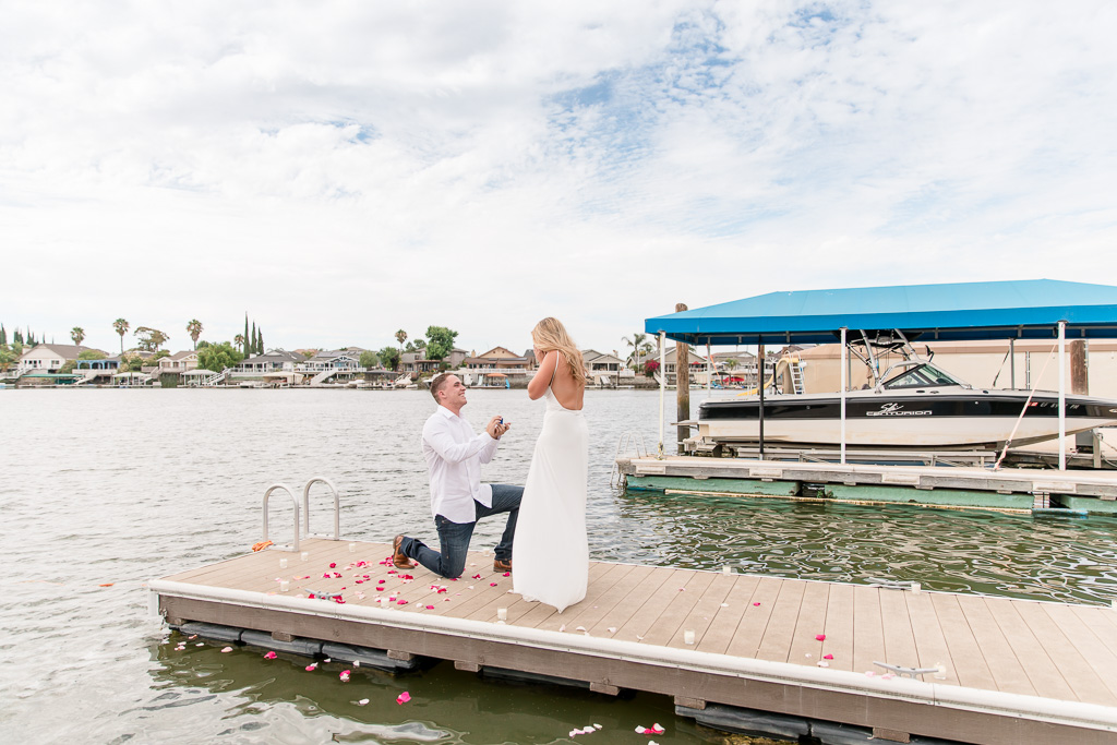 amazing surprise proposal on a boat dock