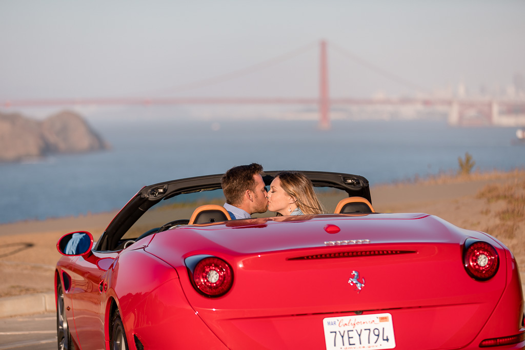 engagement photo in a Ferrari overlooking the golden gate bridge