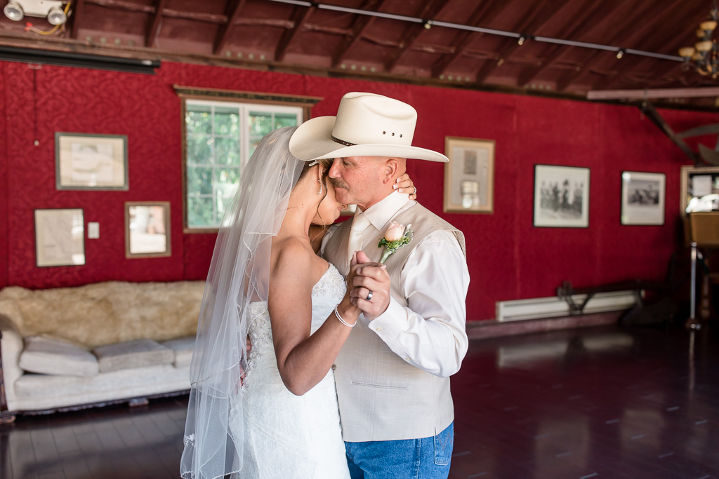 a tender moment between the bride and groom at long branch farm