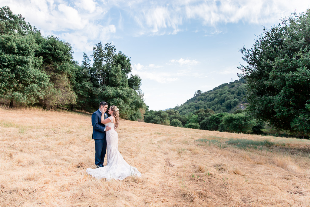 romantic wedding portrait at a grove in Los Gatos with bride in her blush off shoulder wedding gown