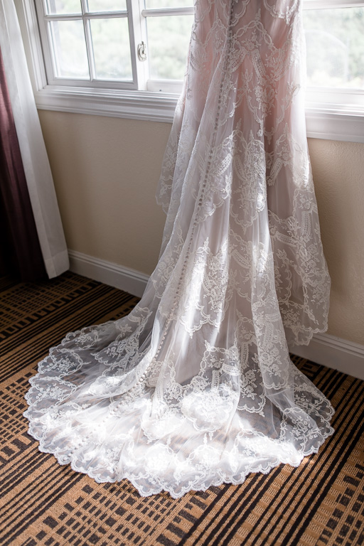 blush lace long train wedding gown