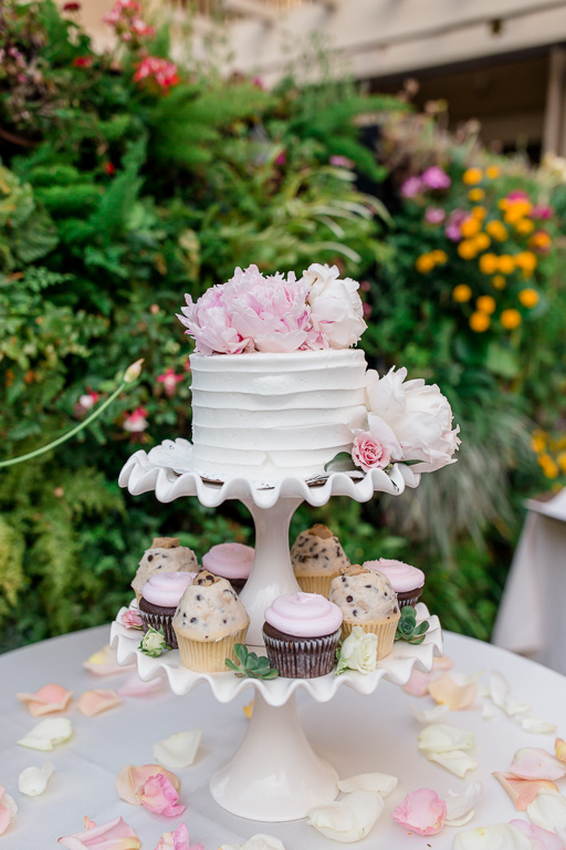 fresh peony cake topper with cupcakes presented at a Toll House Hotel wedding reception