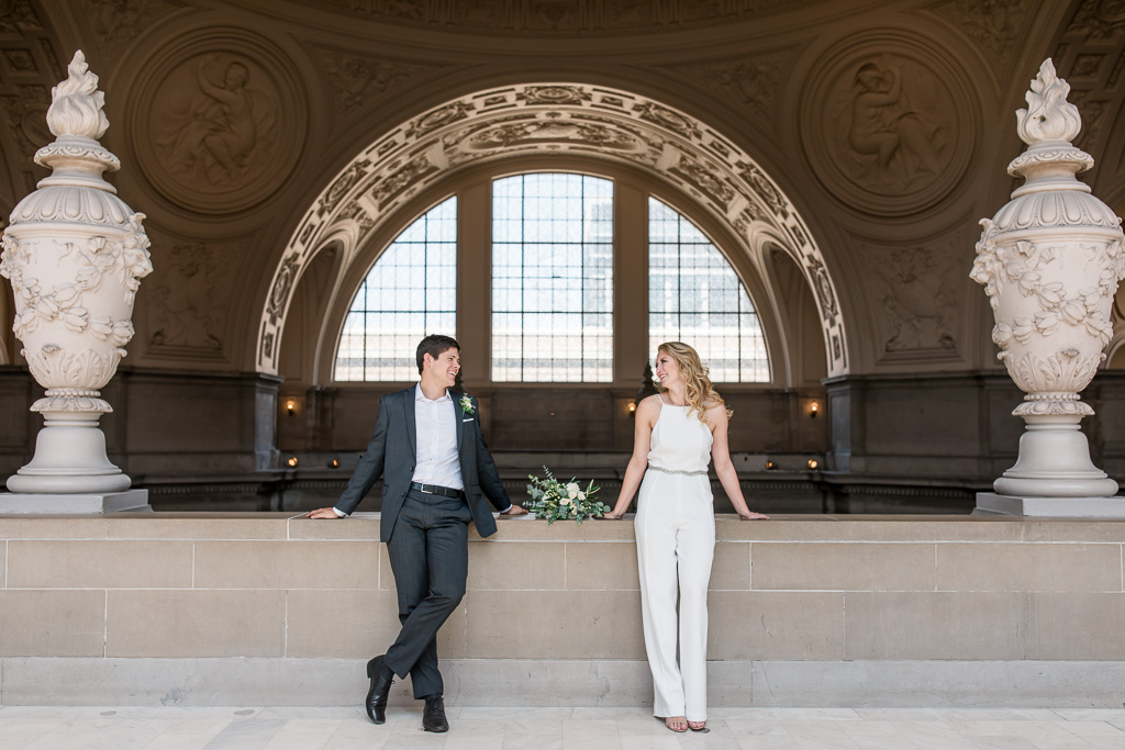 stylish wedding portrait at the grand archway in san francisco city hall