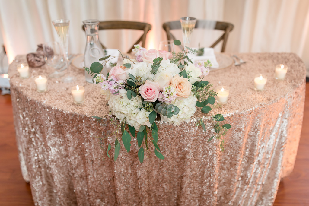 sweetheart table with rose gold sequin tablecloth