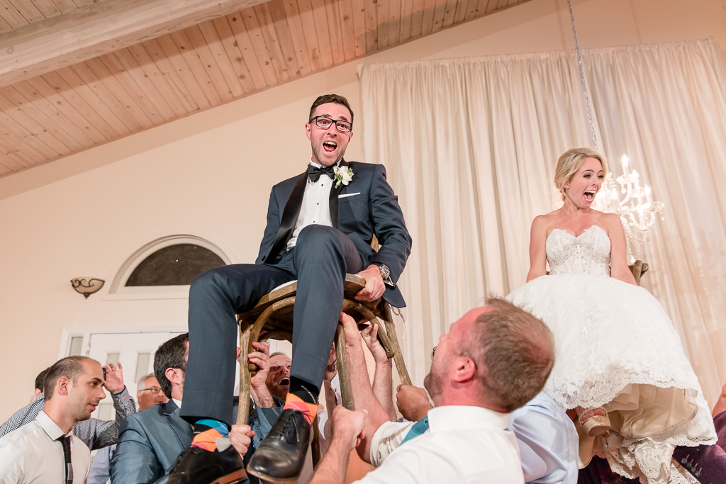 bride and groom hora chair dance at Elliston Vineyards