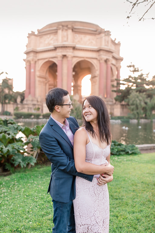 engagement photo on the lawn across the dome