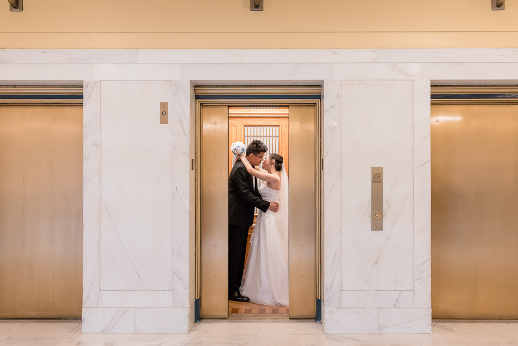 intimate bride and groom wedding portrait at san francisco city hall