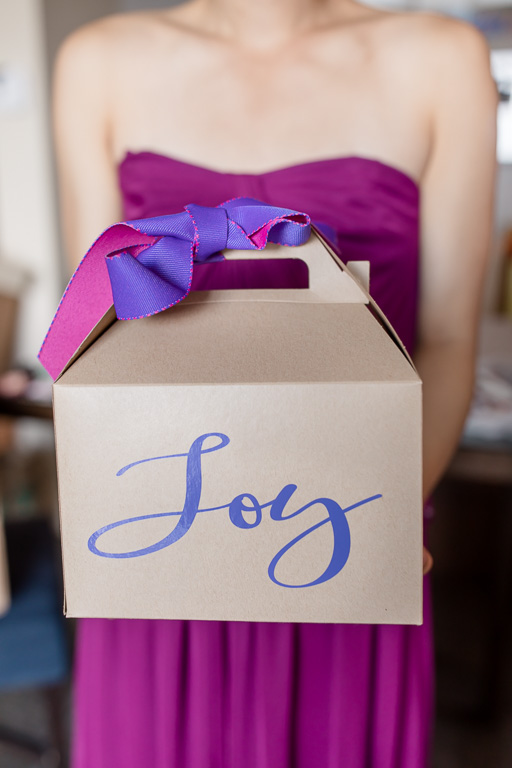 cute customized bridesmaid gift box at a purple themed wedding