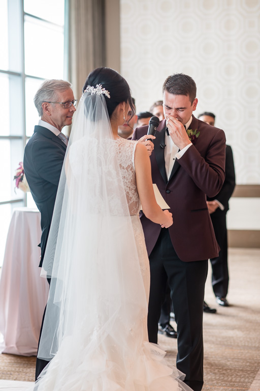 groom got emotional when reading his vows