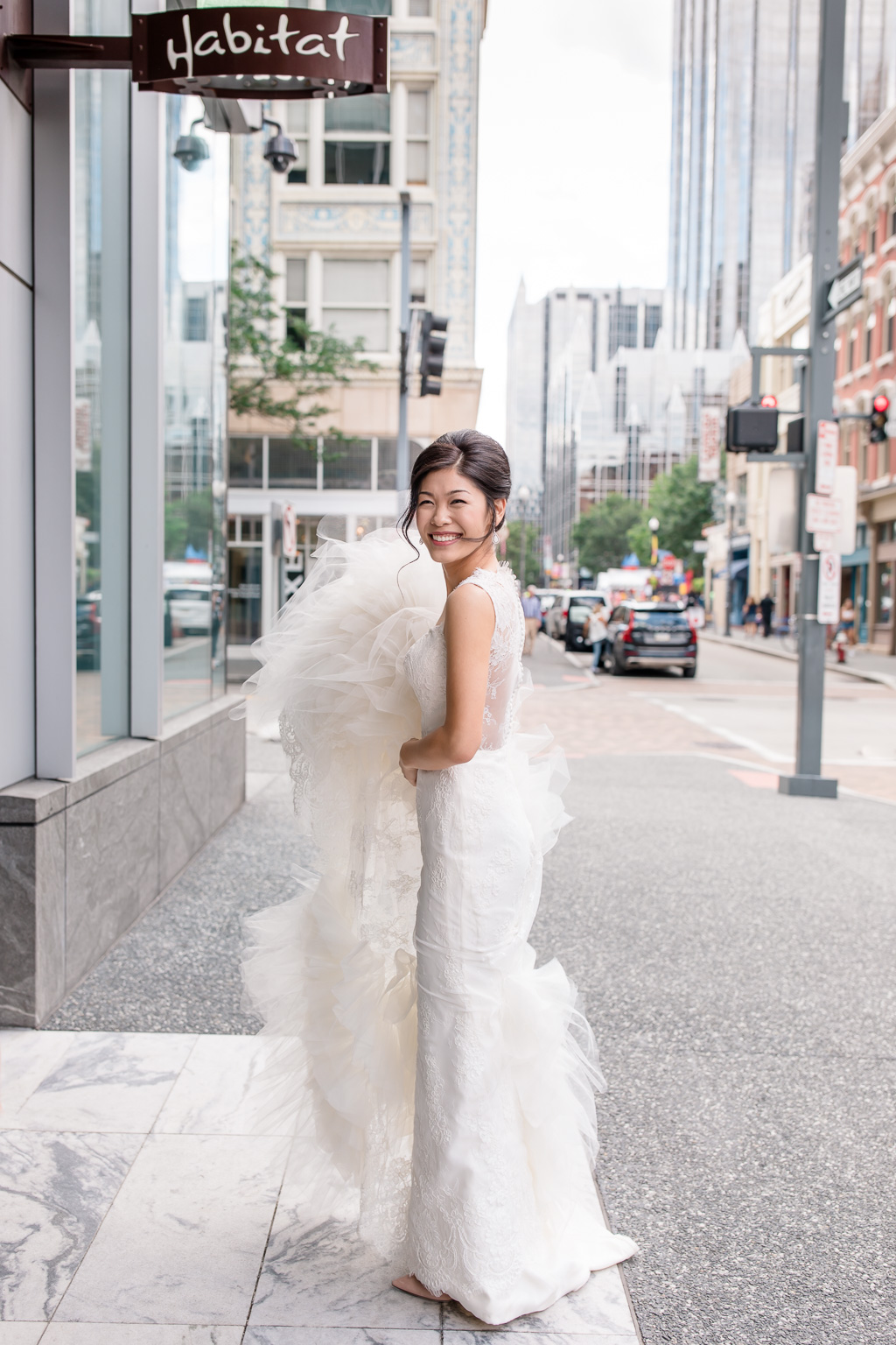 a candid photo of the bride outside fairmont pittsburgh lobby