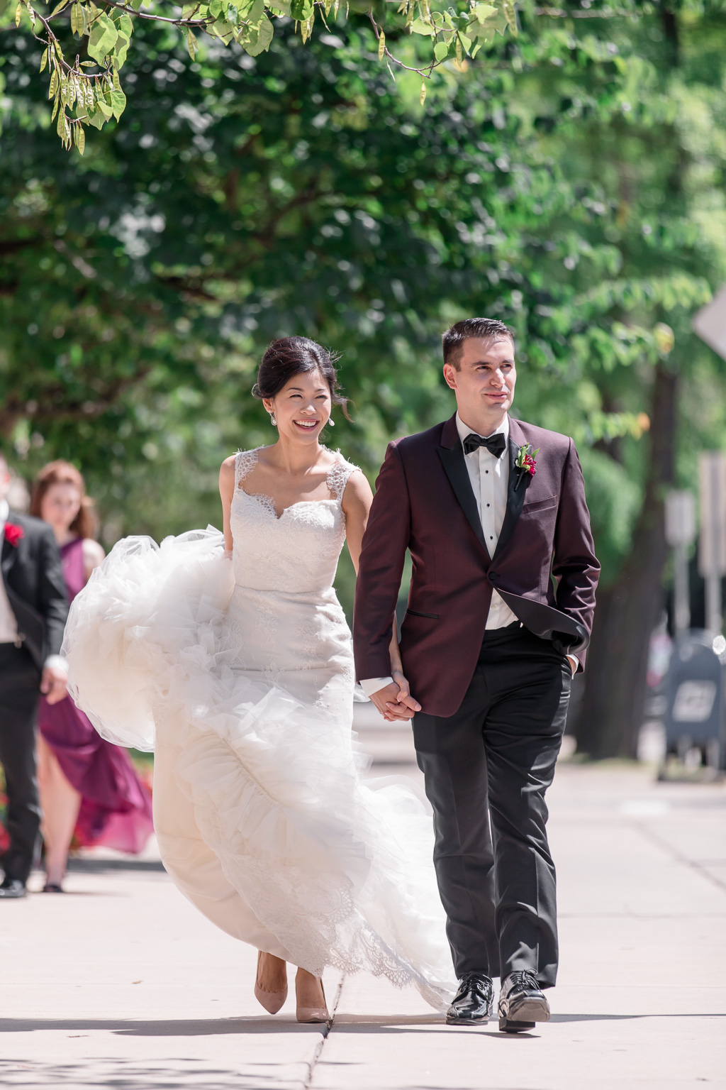 a candid walking wedding photo on pittsburgh street