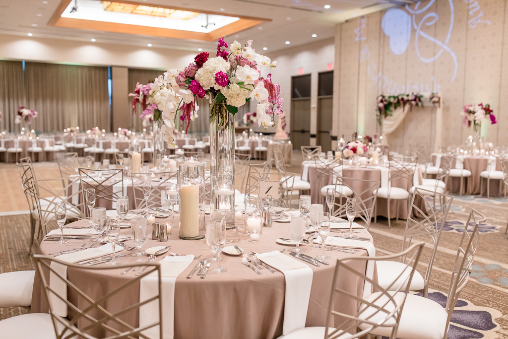 fairmont pittsburgh wedding reception setup with tall floral centerpieces