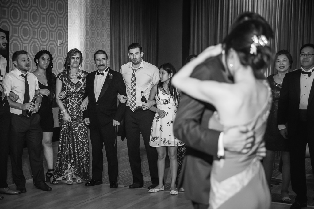 parents' reaction during an emotional bride and groom dance