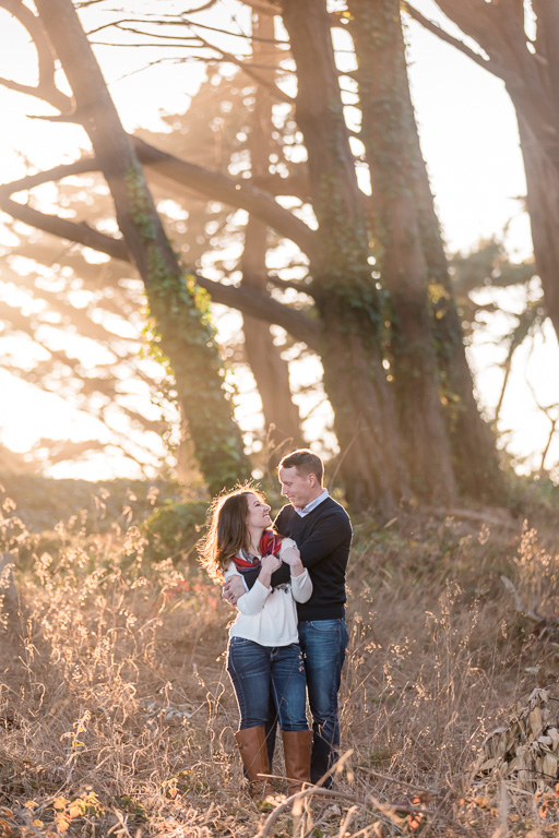 sunset engagement photo in woods