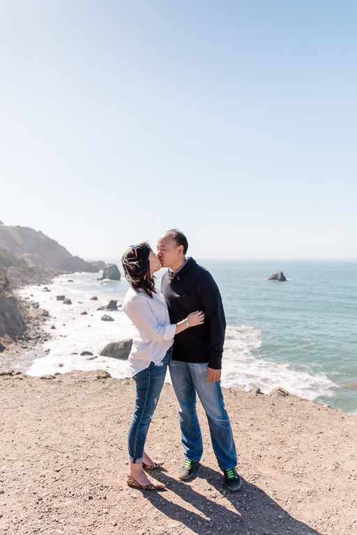 cliffside engagement photo by the pacific ocean