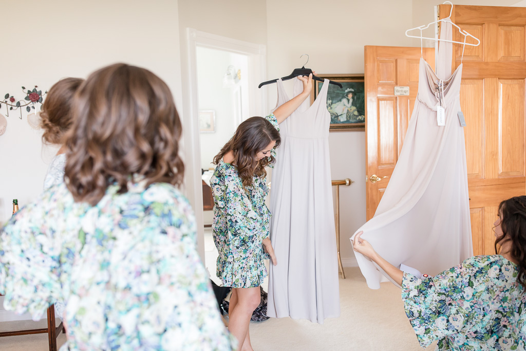 bridesmaids getting ready in their floral robes