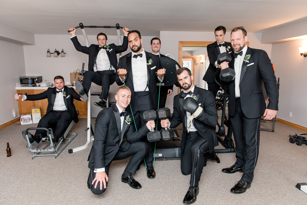 groom and groomsmen hanging out in the gym