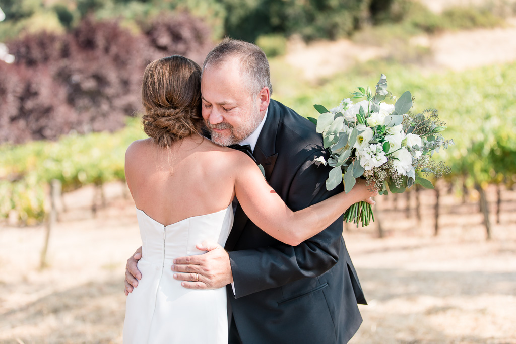 an emotional first look between bride and her dad