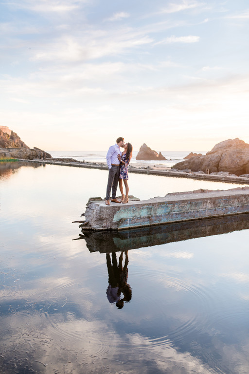 bay area engagement photo couple and their reflection in the water