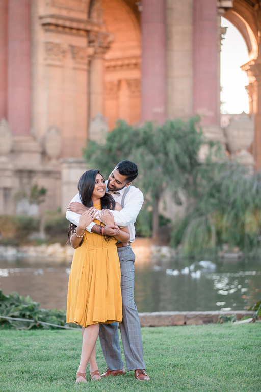 pretty yellow dress and suspenders - engagement photo at Palace of Fine Arts