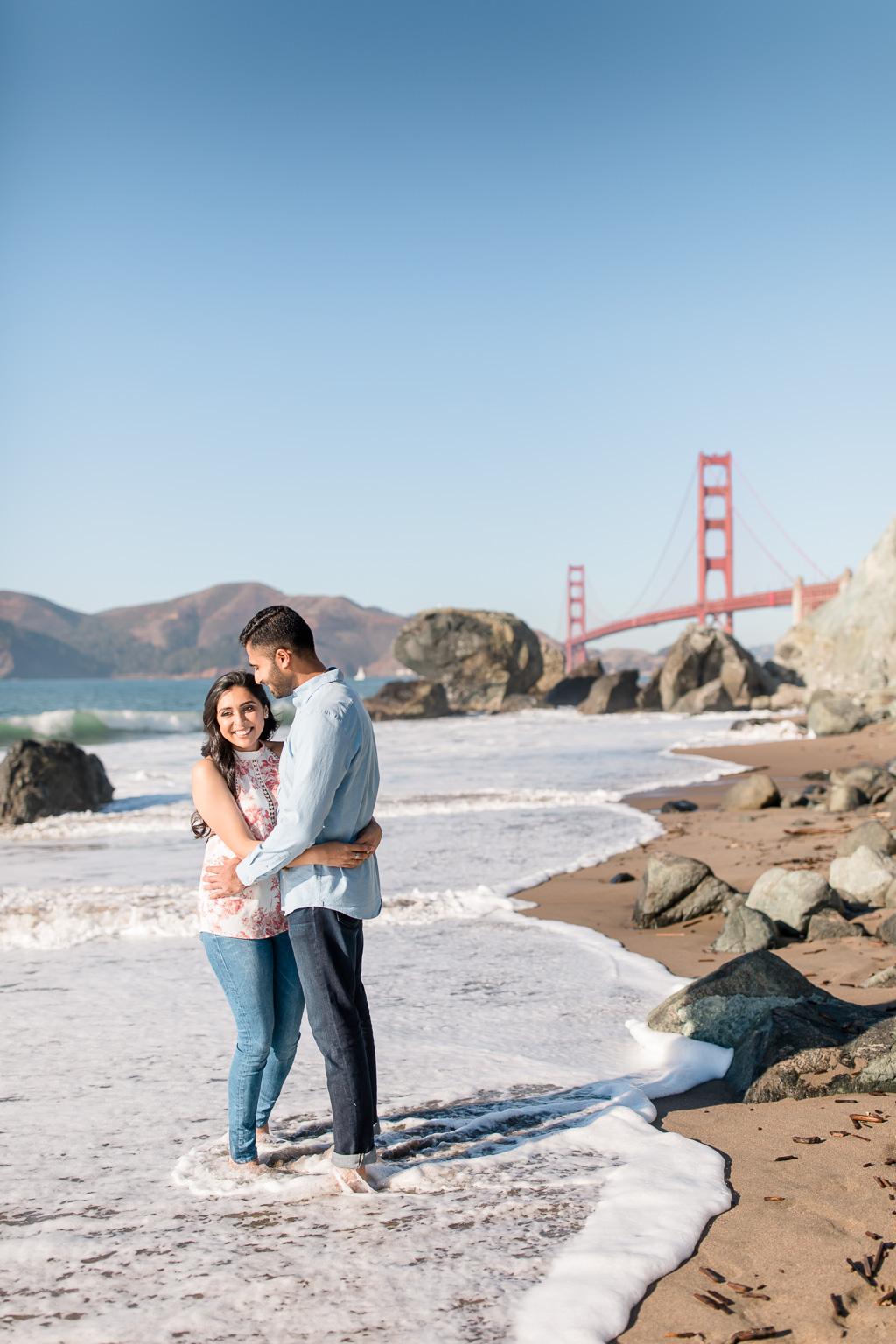 cute engagement photo at high tide in San Francisco Marshall Beach