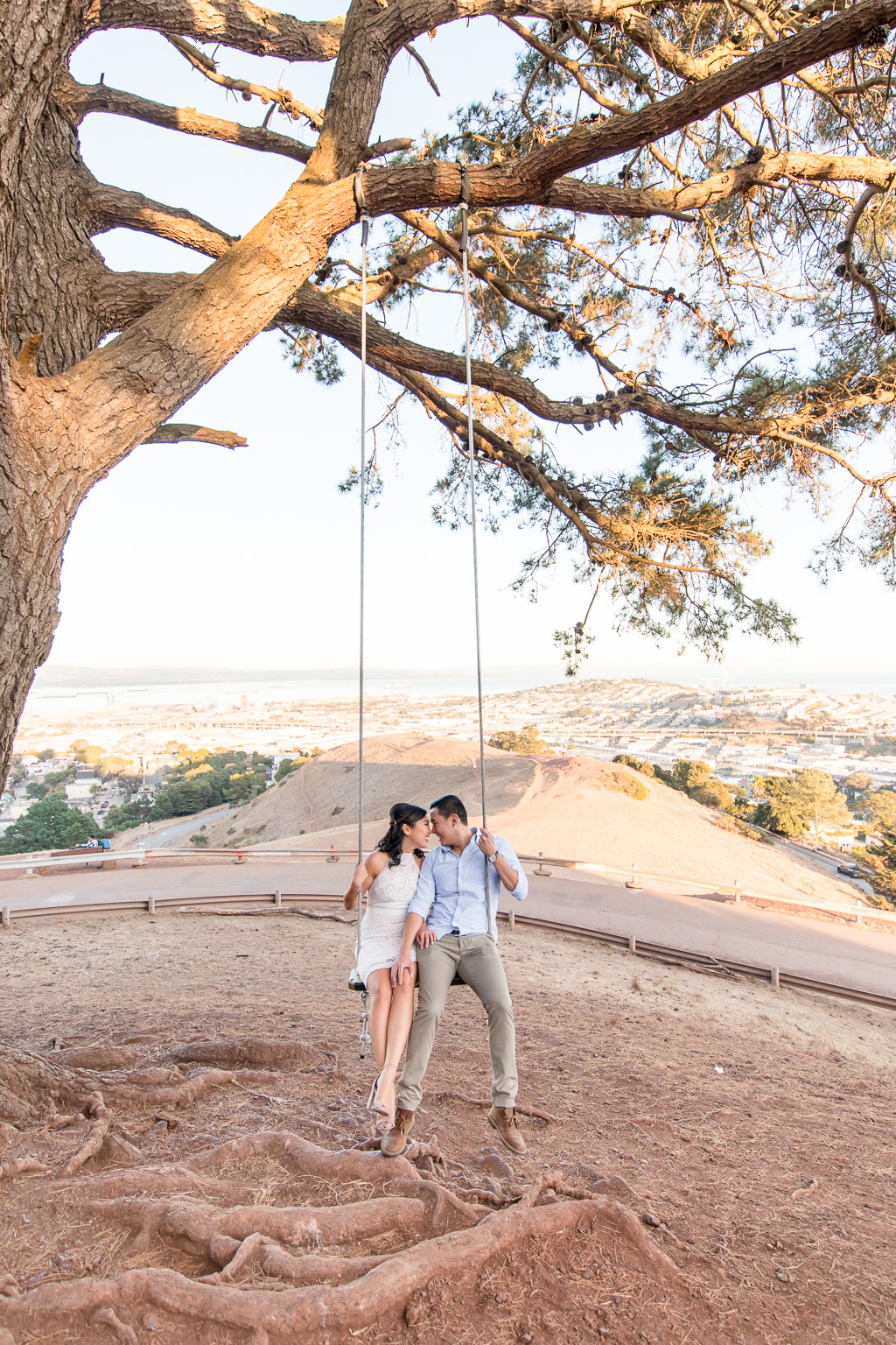 engagement photo at Bernal Heights tree swing