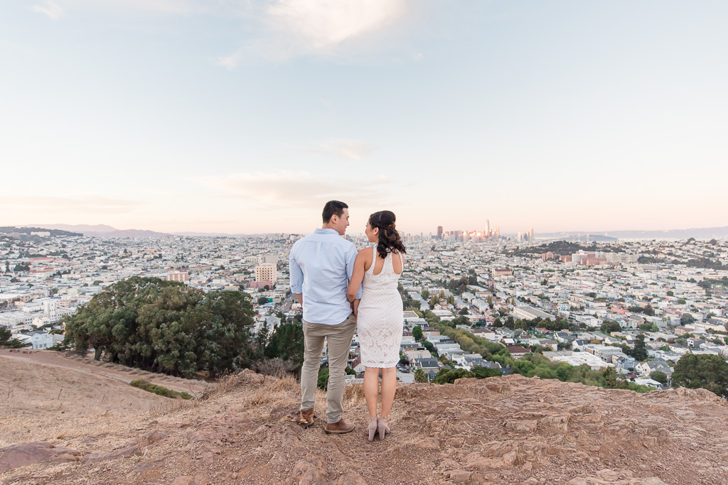 couple at Bernal Hill looking off into the distance