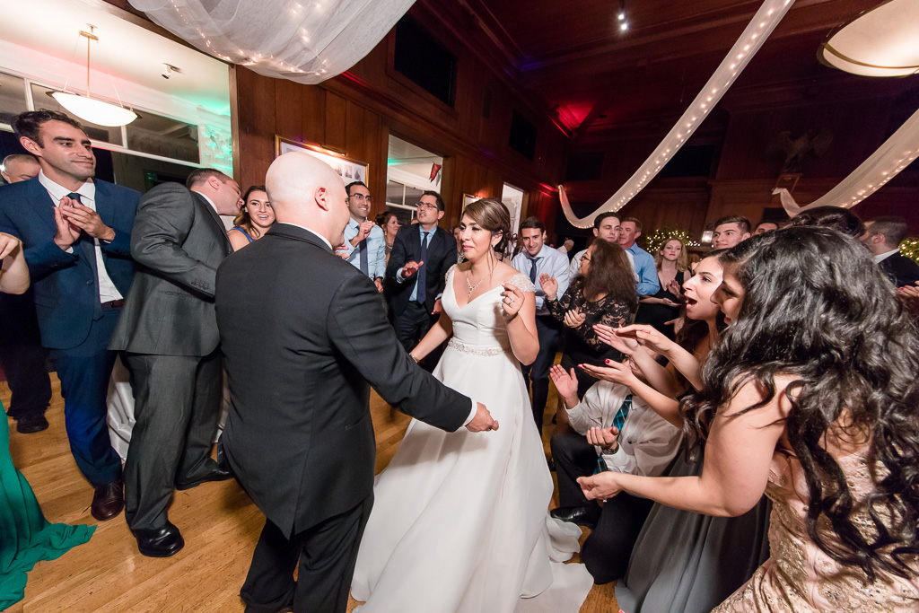 newlyweds dancing while live band is playing