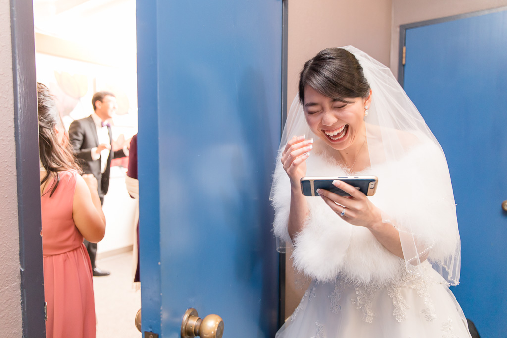 bride had lots of fun watching the guys playing this tricky door game