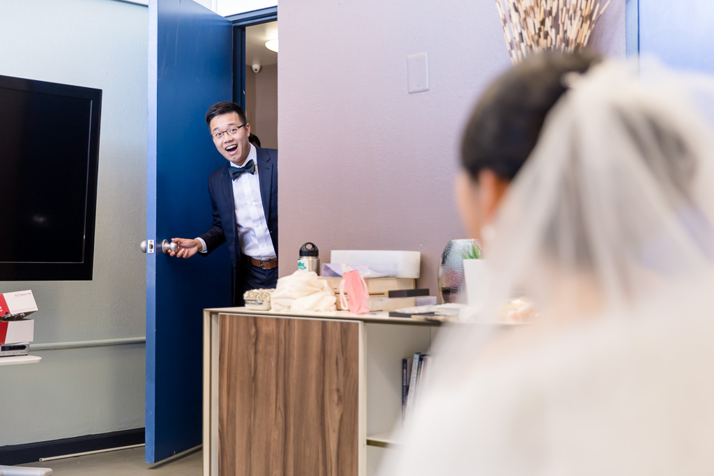 cute reation when groom sees his bride in her wedding dress for the first time