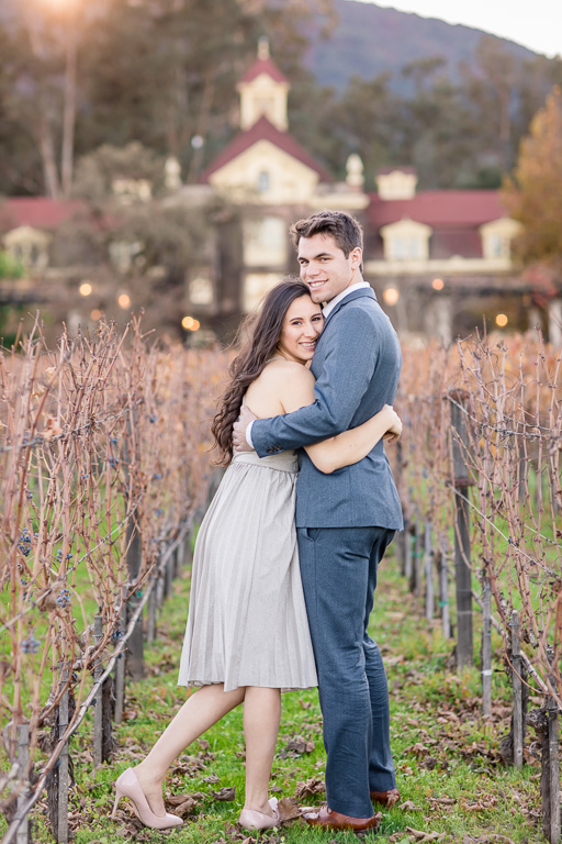 napa engagement photo at vineyard in front of a chateau