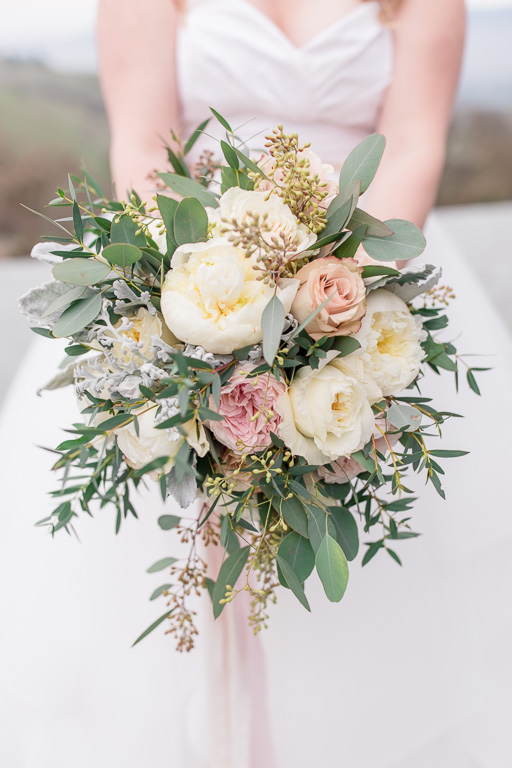 pastel color bridal bouquet with blush ribbon