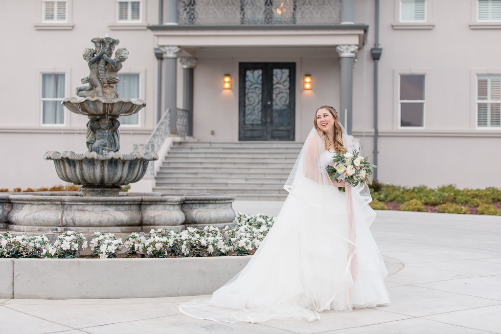 bridal portrait in front of the mansion they got married at