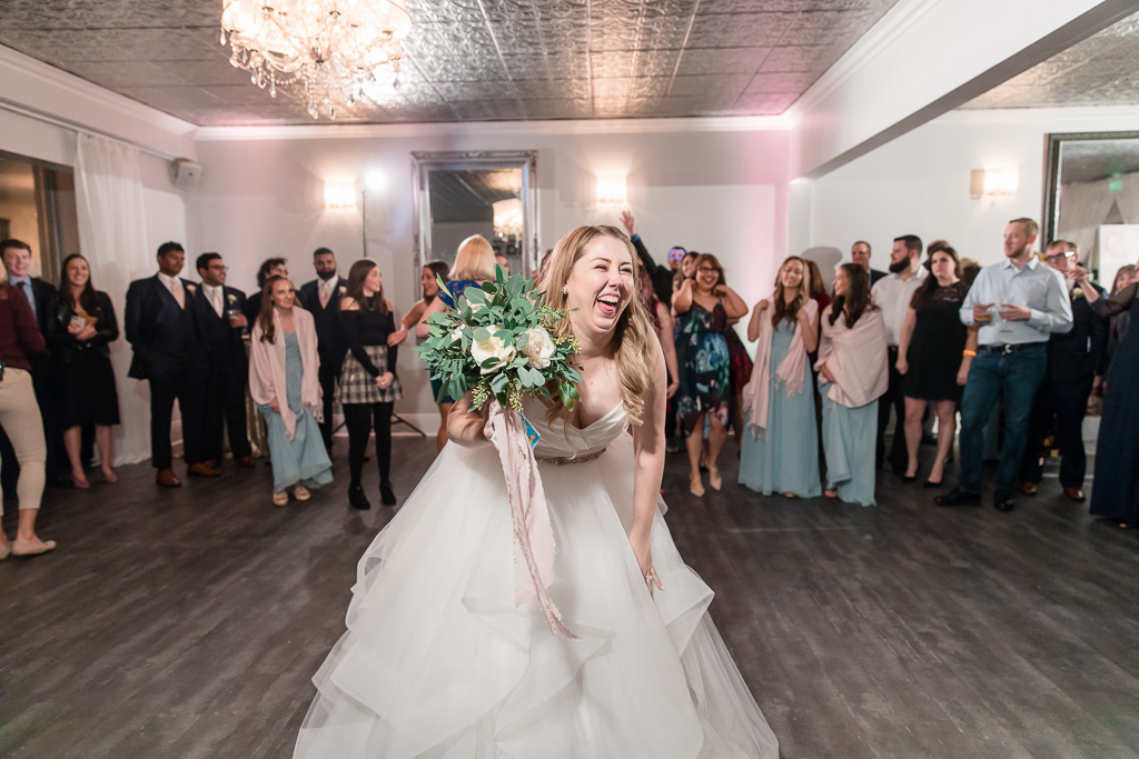 you can tell from this photo how awesome this bouquet toss was