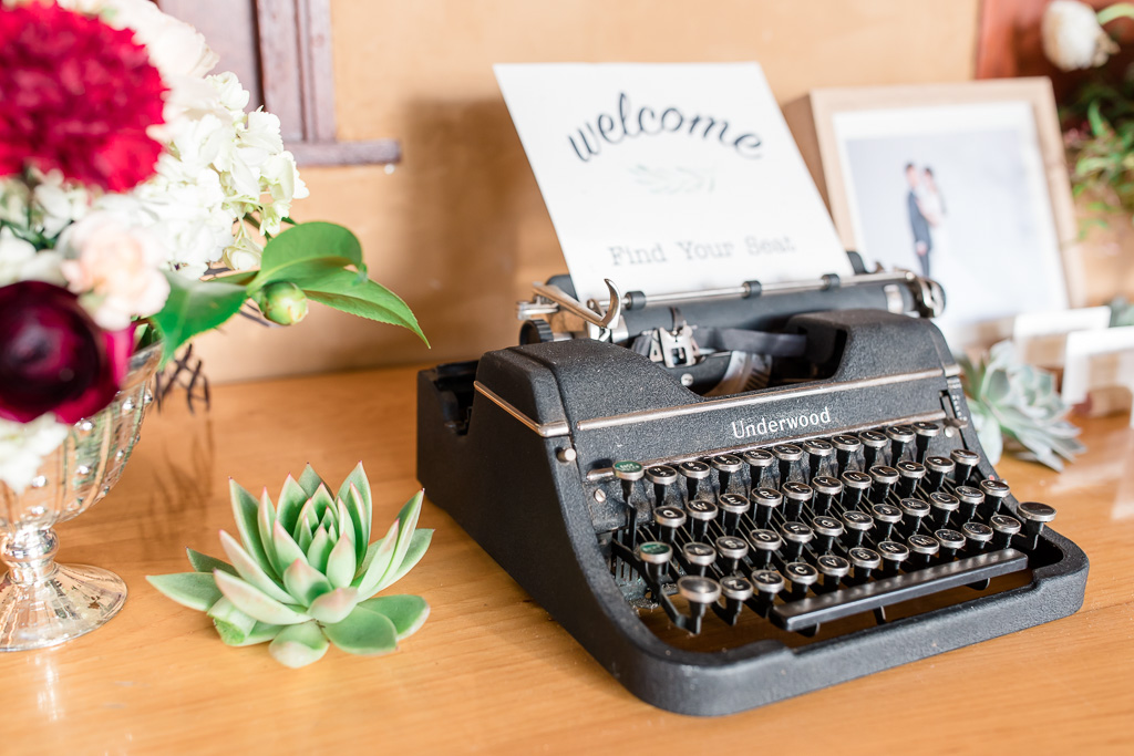 wedding vintage typewriter on the place card table