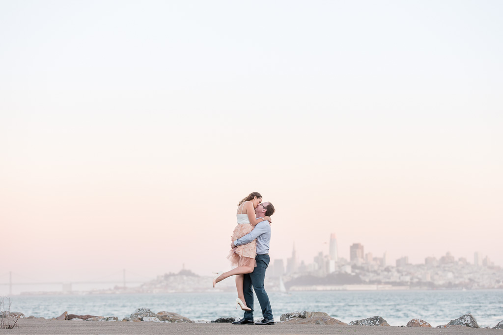 San Francisco city skyline sunset engagement photo kiss