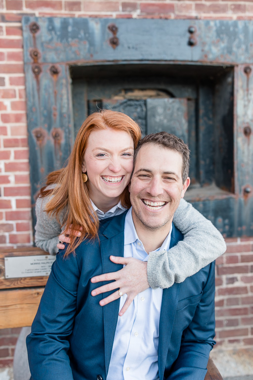 engagement photo by the old fort brick wall in san francisco