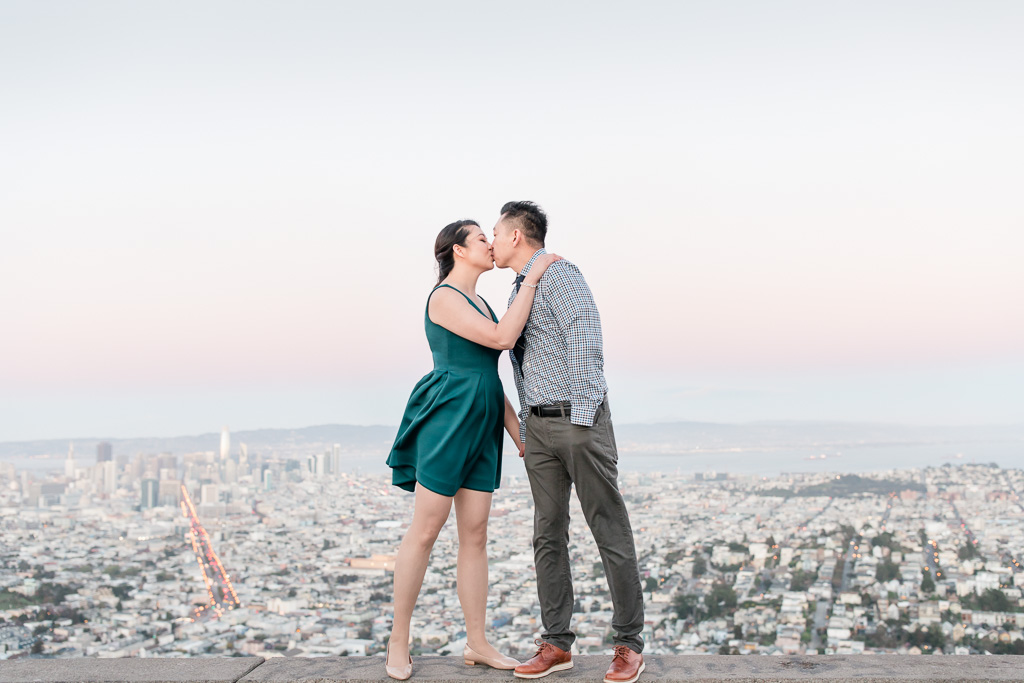 kissing on top of the city of San Francisco