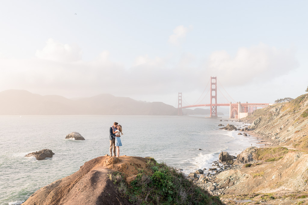 epic panoramic Golden Gate Bridge kissing engagement photo