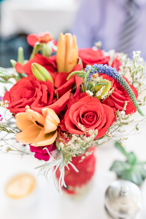 red and orange rose floral wedding bouquet