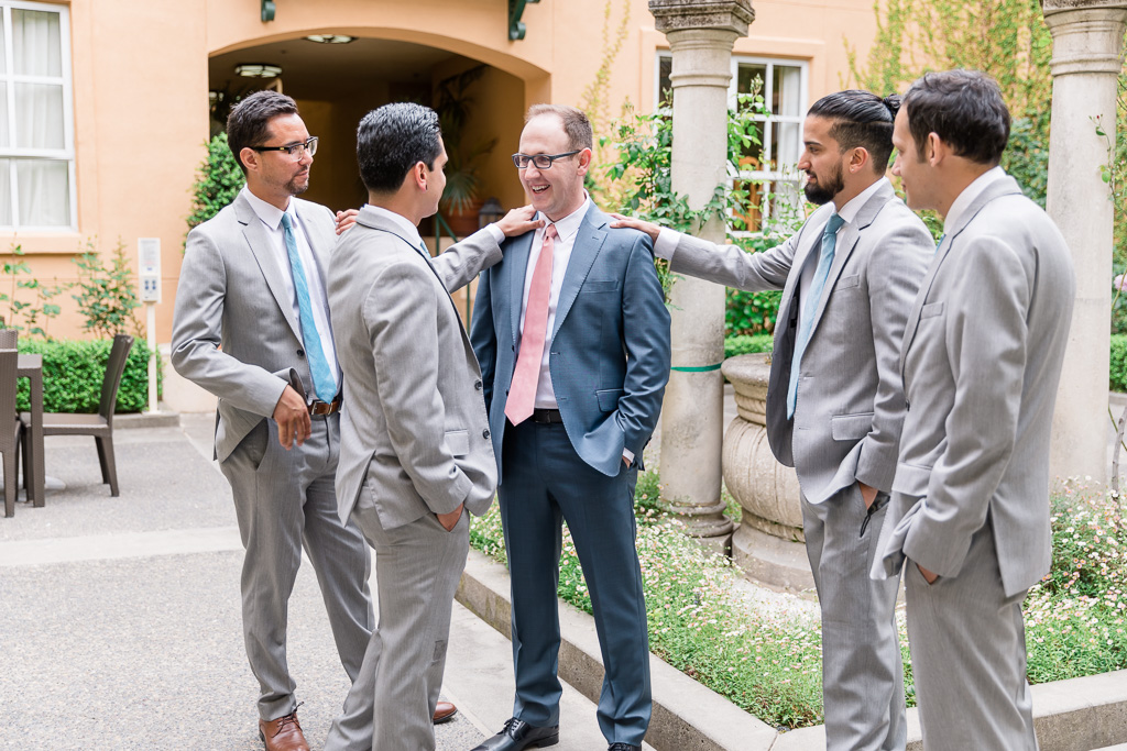 groom and groomsmen photo in Lafayette Park Hotel & Spa courtyard
