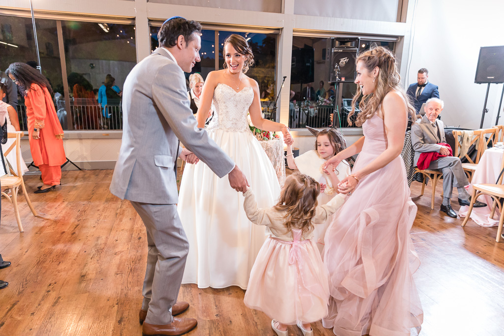 bride dancing with her family