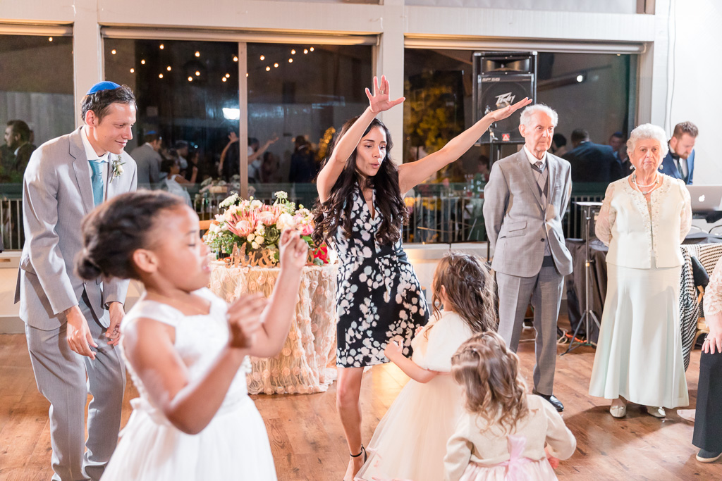 wedding guests enjoying the dance, especially the little ones