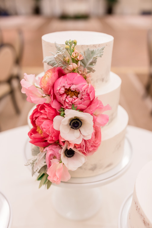 beautiful floral three-tier white wedding cake