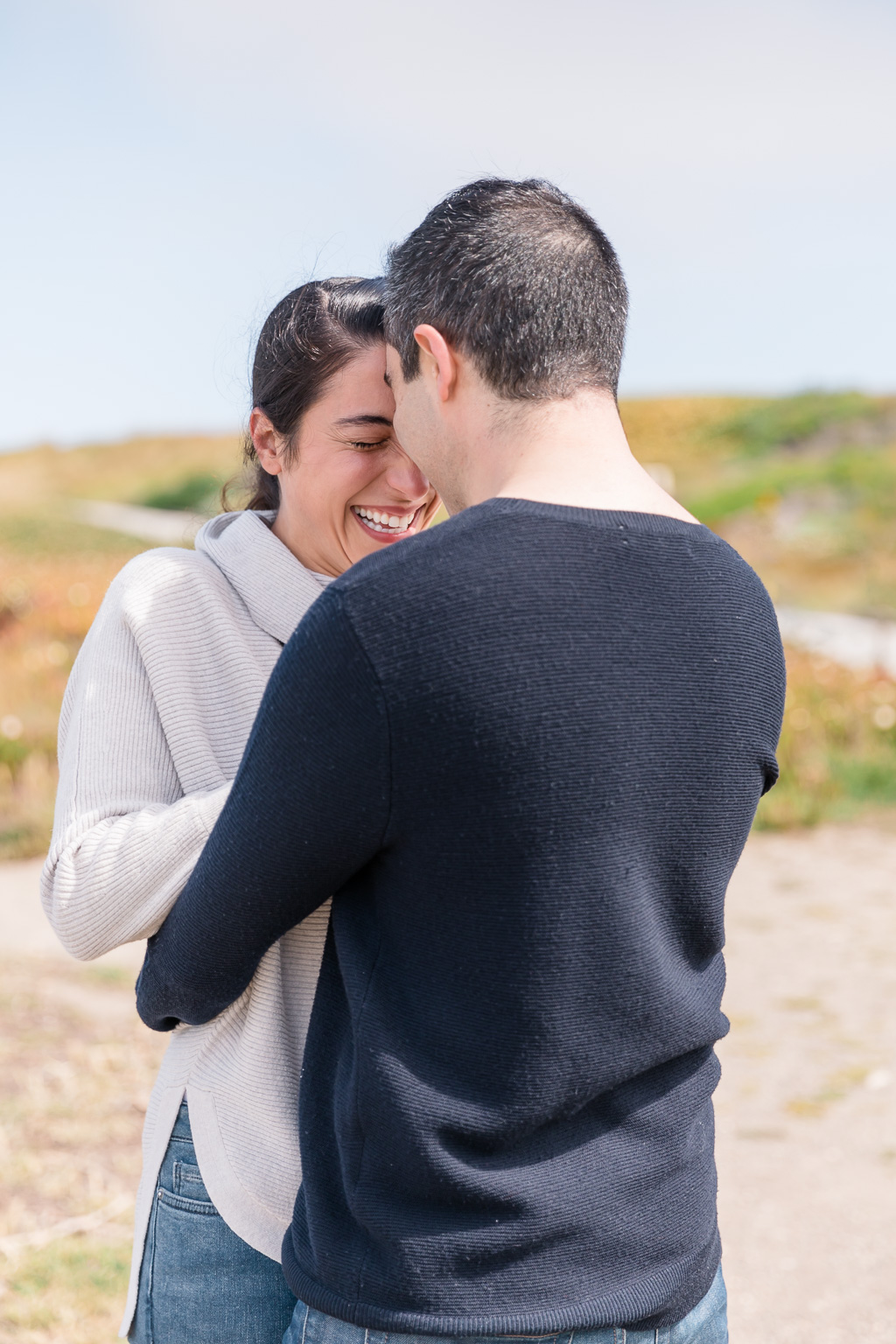 happy excited Half Moon Bay engagement photo
